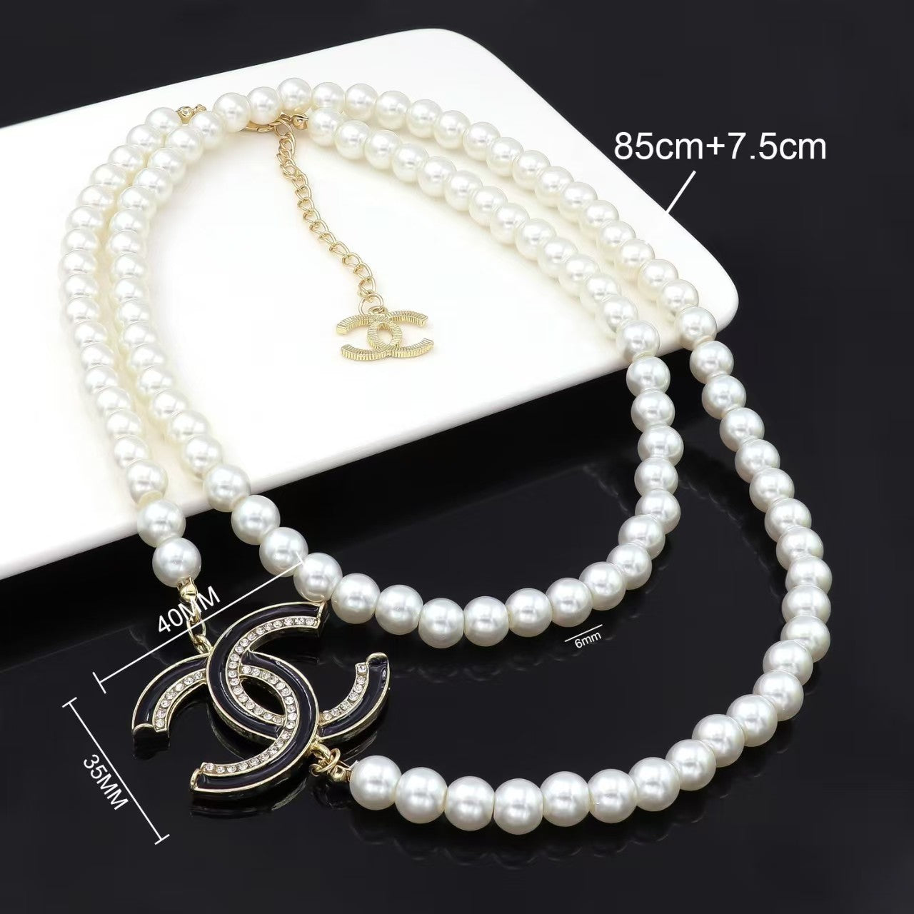 Pearls necklace double layered design with diamond in gold stacked style with white / black letter