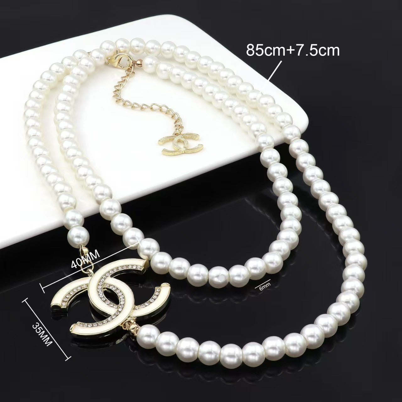 Pearls necklace double layered design with diamond in gold stacked style with white / black letter