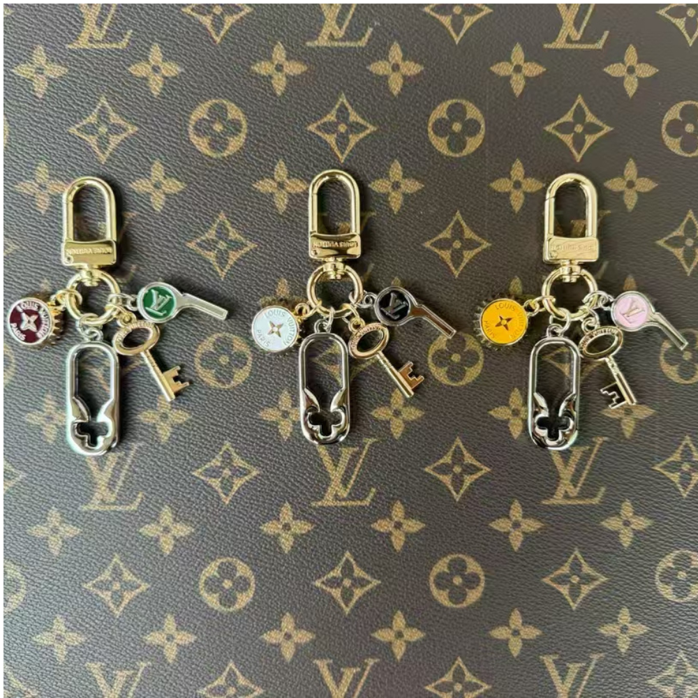 L&V keychains with accessory in the shape of a key, bag charm, car key, house kay, earphone case decoration